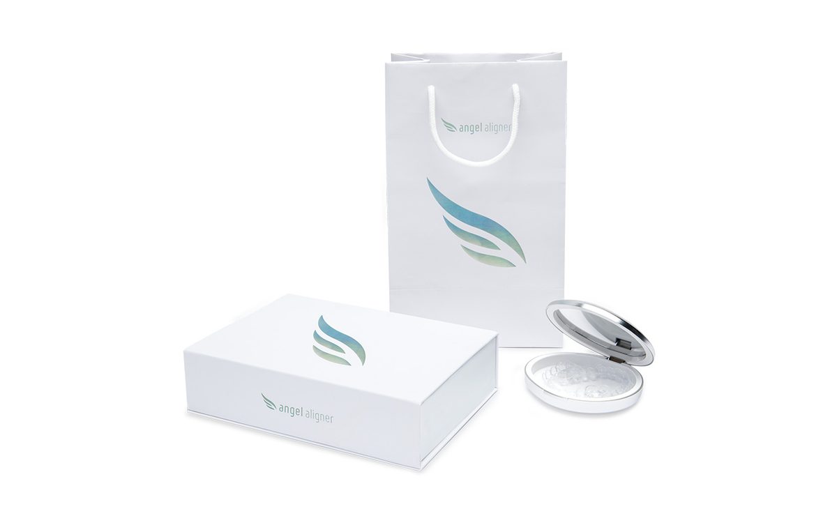 Close view of a clear Angel Aligner tray on a model